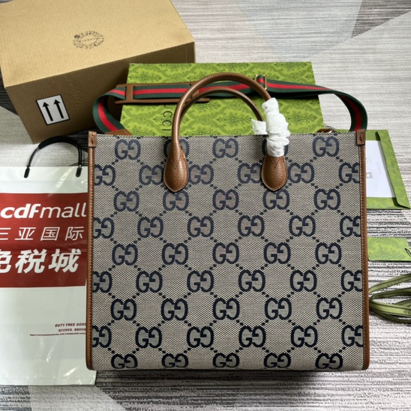 G*u*i shopping bags